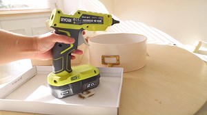 3.7K views · 22 reactions | Our R18GLU-0 ONE+ Cordless Glue Gun is ideal for use on a wide selection of materials - this makes it perfect for countless DIY & craft projects... Watch to see how Dainty Dress Diaries uses the R18GLU-0 to transform her old shoe and gift boxes into pretty office storage! | Ryobi Tools UK | Facebook