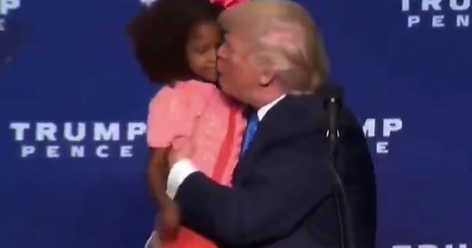 Trump Accused of Being a 'Pedo' After Video Shows Him Forcefully Trying to Kiss Child on the Lips