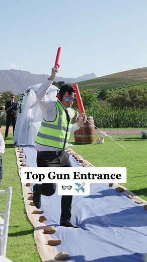 Top Gun themed groomsmen entrance 😎 #wedding #groom #groomsmen #topgun #fyp #weddingvideo