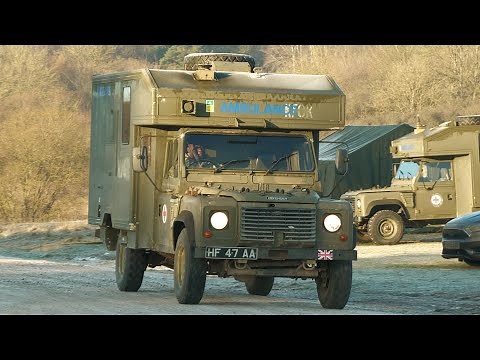 Army ambulances and medical vehicles transiting a field hospital 🚑🪖