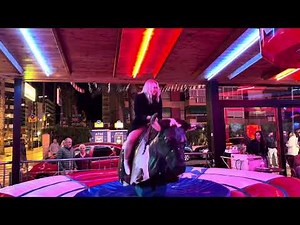 Lush lady riding on a Bull in Benidorm | Bull riding 4K