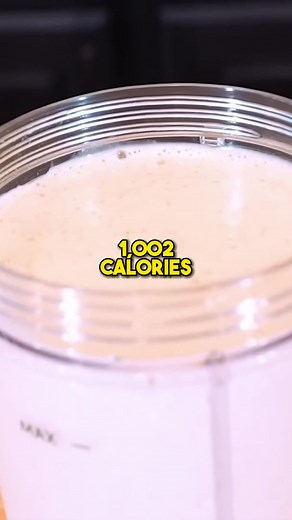 The ULTIMATE Muscle Building Smoothie 🥤 Ready to fuel your gains with taste and simplicity? Try this Muscle-Building Smoothie that's a powerhouse of nutrients and flavor! Perfect for hard gainers and anyone looking to pack on some mass. 💪🍌 🍹 Ingredients: - 480g (2 cups) almond milk - 80g old-fashioned oatmeal - 117g frozen bananas - 32g natural peanut butter - 21g honey - 62g (2 scoops) vanilla whey protein - 2g cinnamon - 100g ice cubes 👨🍳 Instructions: 1. Combine almond milk, oatmeal, fr