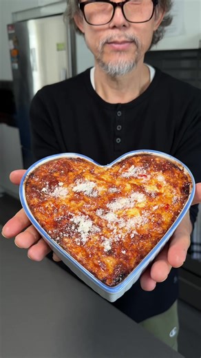 Making a simple quiche for Valentine’s Day for my wife. Ingredients Bottom (Crust) - 120 g biscuits (crushed) - 40 g butter (melted) Filling - 5 eggs - 30 ml milk - 1/2 tsp salt - 50 g onion, finely chopped - 30 g red pepper, finely chopped - 30 g yellow pepper, finely chopped - 20 g carrot, finely chopped - 50 g cheddar cheese, shredded - 50 g mozzarella cheese, shredded Instructions Prepare the Crust -Place the crushed biscuits and melted butter into a zip-top bag. Seal and mix well until even