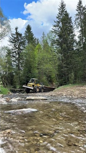 Heavy Skidder Pulls a Massive Log Through the Creek #logging #forestry #tractor