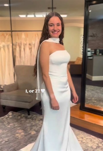 Imagine saying YES to the dress and walking down the aisle on your wedding day. We’re in love with these two uniquely stunning wedding gowns—which one is yours?✨ 1 or 2? ✨⁠ ⁠ ⁠ 1️⃣ A chic satin wedding gown with a modern choker neckline, designed for the effortlessly stylish bride⁠ ⁠ 2️⃣ A corset-fitted lace wedding dress, perfect for the romantic bride who loves on-trend details⁠ ⁠ Both gowns are available now in our Harrisonburg showroom 🤍⁠ ⁠ 📍 Amanda’s Touch Bridal⁠ Harrisonburg • Roanoke •