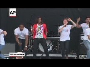 First Lady Michelle Obama shows off her dance moves at the annual White House Easter egg roll as par