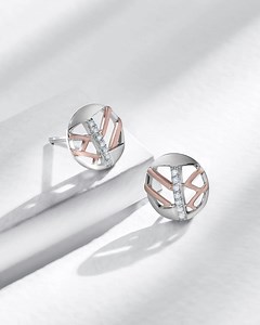 Encased in a gorgeous circular motif and outlined with delicate rose gold lines, these platinum earrings are a reflection of the extraordinary woman you are. Crafted in 95% pure platinum, our season’s collection celebrates the joy of being a woman, the joy of being you. #VeryRareVeryYou. Explore the latest collection on www.ptevara.in #VeryRareVeryYou #PlatinumEvara #CelebrateYou #Femininity #Woman #Womanhood #PlatinumJewellery #Rare #Metal #Platinum #PT950 | Platinum Evara