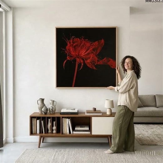 A single red bloom. A world of atmosphere. ✨\n\nThis striking floral canvas print pairs a rich cri...