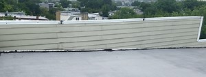 Parapet Wall Problems: Leaks, Repairs & Code Requirements