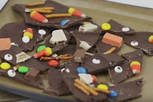 540 reactions · 353 shares | Do you have any left over candy from decorating gingerbread houses, or cookies? Here's a great way to help you use it up. This is our Halloween bark, but you could very easily turn this into a Christmas bark by using up some of that Christmas candy. | HowDoesShe | Facebook