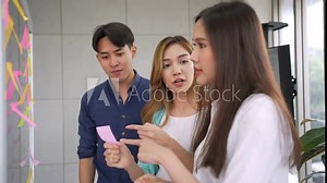 A team of young multinational business people daily Scrum meeting and update status for new project, report and proposal. Technology, digital marketing startup, brainstorm teamwork at office meeting