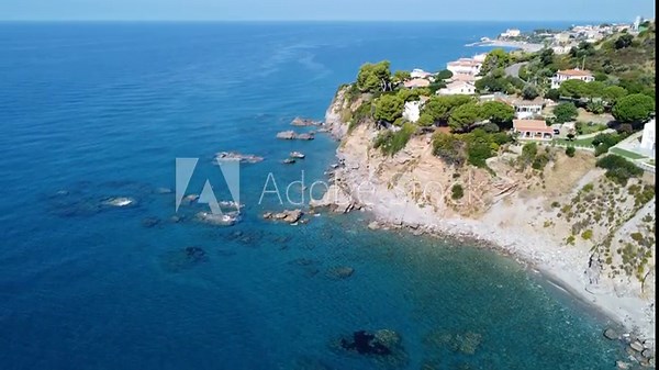 Bellissima ripresa aerea di Cittadella del Capo presso Bonifati in Calabria Provincia di Cosenza. Nel video Cala Del Faro con la sua tipica scogliera sul mare turchese