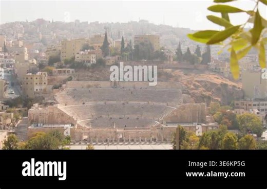 Amman, Jordan - 25th november, 2025: Scenic view of the 2nd-century Roman Theatre in Amman, Jordan, framed behind the iconic "I Love Amman" sign. Ancient history and modern city branding inAl-Balad Stock Video Footage - Alamy