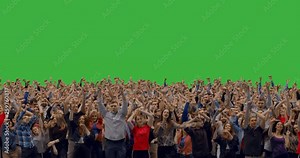 GREEN SCREEN CHROMA KEY Model released, front view of huge crowd jumping and cheering at a concert or a show. . Created with crowd replication techique. 4K UHD ProRes 4444