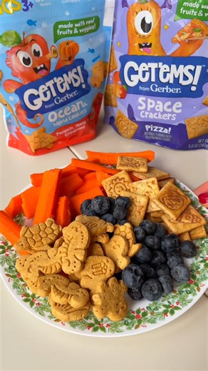 Gerber on Instagram: "Holiday Parties are here! And we are showing up for the little ones✨ this snack plate brings all the flavors with easy bites for kids and toddlers 🥰 Hosting just got a whole lot easier🥄💙 Toddler – Gerber Holiday Snack Plate - Mild Cheddar Lil' Crunchies - Apple Sweet Potato Lil' Crunchies - Mashed Raspberries - Thinly sliced cucumbers Kids ages 3+ – Get'ems! Holiday Snack Plate - Carrot sticks - Blueberries - Pizza Space Crackers - Ocean World Pumpkin, Apple and Cinnamon