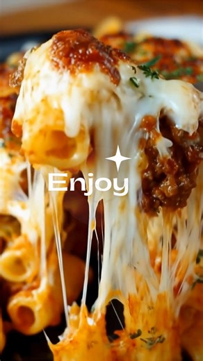 Loaded Baked Ziti with Three Cheeses *Bubbling cheese, hearty sausage, and rich tomato sauce—this is the kind of comforting baked pasta that fills the kitchen with warmth and brings everyone happily to the table. Familiar, satisfying, and just right for sharing.* What You'll Need 1 pound ziti pasta 1 pound Italian sausage, casings removed 28 ounces crushed tomatoes 15 ounces tomato sauce 15 ounces ricotta cheese 15 ounces mozzarella cheese, shredded 1/2 cup provolone cheese, shredded 1/2 cup gra