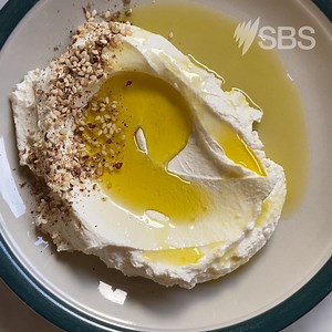 Pop some yoghurt in a Chux cloth and after a few hours, you’ll have your very own labneh. #WhileYouWereSleeping bit.ly/labenhmaking | SBS Food