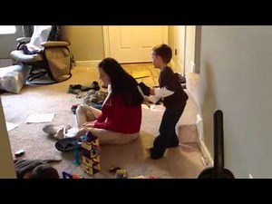 Rowan brushes mommy's hair