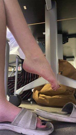 College girl pretty feet dangling