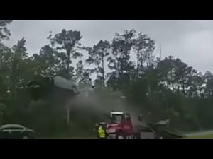 Shocking Footage: Distracted Florida Driver Launches Car Off Tow Truck Ramp! (May 24, 2023) #bodycam