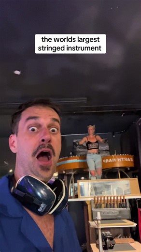 i forgot to post this from my show in LA at the house of the Earth Harp, the worlds largest stringed instrument. and then i played violin as a dinosaur.