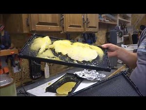 Coating the bee frames with wax