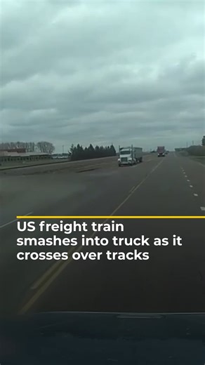 769K views · 4.1K reactions | Dramatic video shows a freight train ploughing into a truck’s trailer as it crossed tracks next to a highway in the US state of Minnesota. Occupants of the truck and train were treated for minor injuries. | Al Jazeera English | Facebook