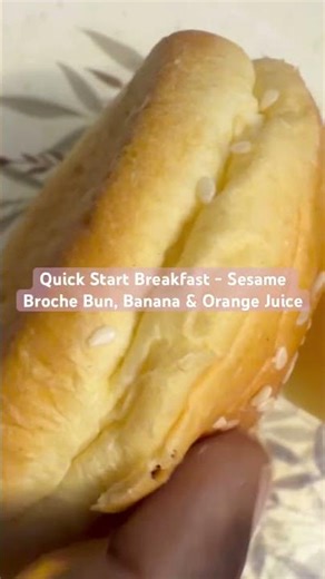 Quick Start Breakfast - Sesame Broche Bun, Banana & Orange Juice. See description