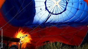 Blow up balloon with gas jet burner Stock Video