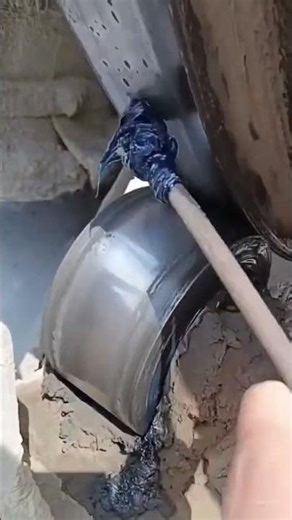 the process of providing lubrication for the friction of rotating machinery