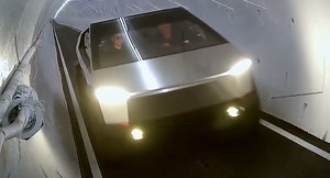 Jay Leno And Elon Musk Drive Tesla Cybertruck Through A Boring Company Tunnel | Carscoops