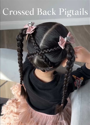 This crossed pigtails hairstyle is simple but SO pretty 💕 The back detail makes it extra special ✨ Save this for your next hair day 💗 Watch till the end to see the full look! #hairstyletutorial #kidshairstyle #pigtails #braidedhair #momlife