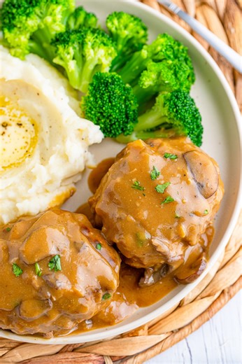 Southern Hamburger Steaks with onion mushroom gravy is so easy and packed with flavor! | Incredible Recipes