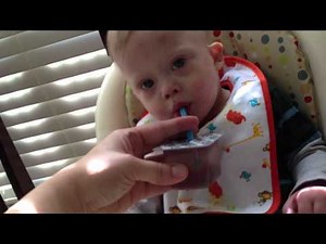 Baby With Down Syndrome Learning How To Drink From a Straw