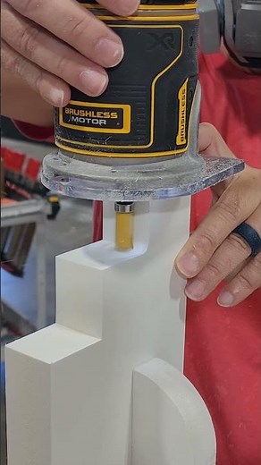 Squaring up some radius corners on these PVC Corbels using a Dewalt Router with a top bearing bit.