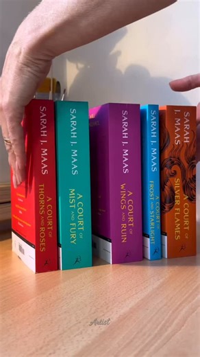 Artist on Instagram: "At first glance it looks like a painted box but then you realize every image lives on the edges of real pages stacked together into a single object. This sculptural book artwork by Ania Artego transforms an ordinary volume into a cinematic scene where a couple stands beneath a night sky with wings unfolding behind them and mountains stretching across the page edges. Shared on August 30 2025 the piece reveals its full story only when the book is closed turning the spine and 