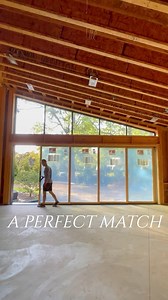 Perfectly matched: this five-panel MultiGlide™ Door is configured to match the custom windows above, and the those windows are matching the roofline. What a stunning look! Thanks for sharing this project with us, @thebigdoorguys! #CustomBuild #NewConstruction #WorkInProgress #AndersenWindows #PatioDoor | Andersen Windows Doors