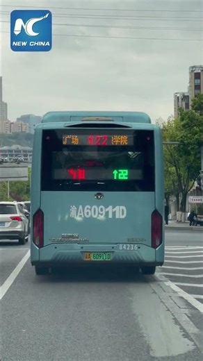 On backs of buses, LED screens display traffic light info