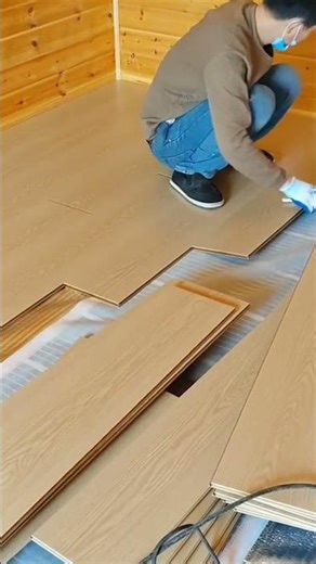 Parquet Wood Floor Installation Process in a Room Using the Click Technique