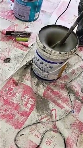 pouring self leveling floor compound to create a smooth surface and prepare for the final coating