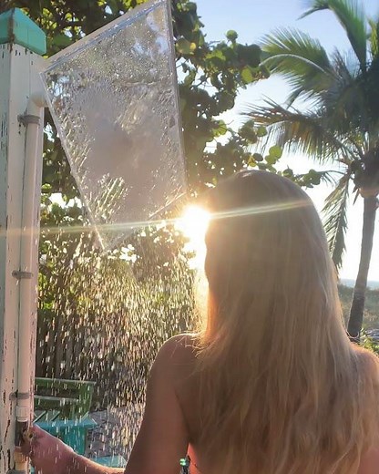 Girl Showers with Cool Showerhead on the Beach - Clear Shower XL