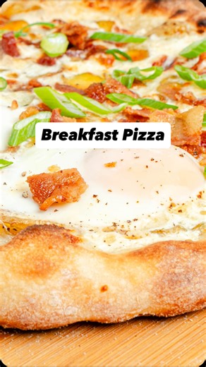 Pizza for breakfast? SIGN ME TF UP. 🙌 This is my ideal breakfast pizza, made with a cheesy white sauce, crispy potatoes and bacon, and eggs on top. Yes, the eggs did slide a bit when I put this in the oven, that’s why they’re both on one side of the pizza. In a perfect world they’d be more evenly spaced out, but if this is the only imperfect thing happening to you, your life is going pretty dang well I’d say! ⁠ ⁠ 🔗: Find the full breakfast pizza recipe at the link in my bio (@the.practical.kit