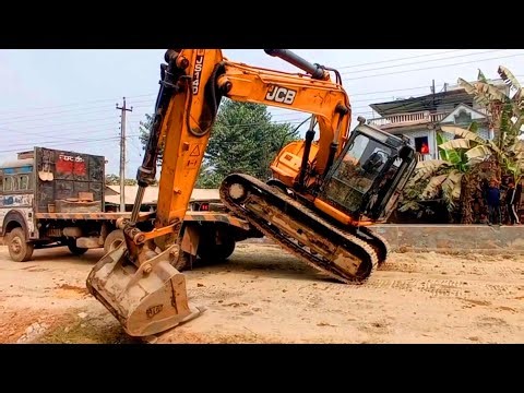 Efficient JCB Excavator Loading Techniques On Truck By Skilled Operator