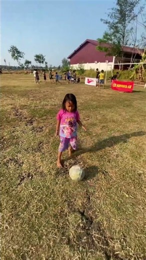 Girl playing soccer