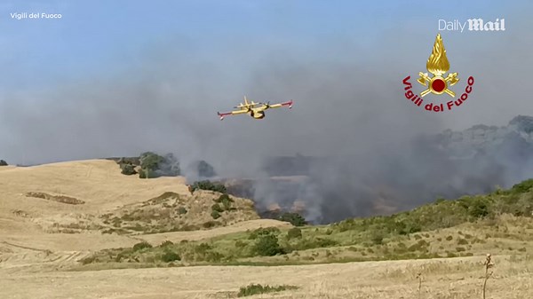 Crews battle wildfires in Spain and Italy amid Europe weather chaos
