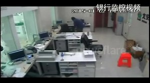 Bank robber gets trapped in teller cage in China
