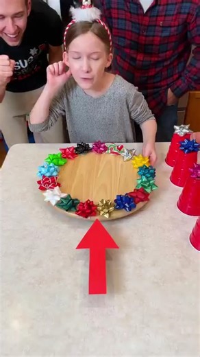 "Spinning Bows Christmas Family Game 🎁 Kids, Dad, and our whole Benson family play a simple diy party game with Christmas gift bows and candy prizes. Funny game to play at your Christmas family gathering or Christmas Party." 🎬 This video was produced by Network Media and Benson Bros | Challenge Accepted