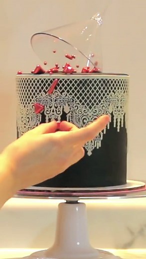 Elegant bachelorette cake with black buttercream and lace