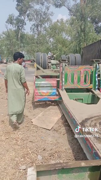 Inspecting a Colorful Decorated Flatbed Trailer