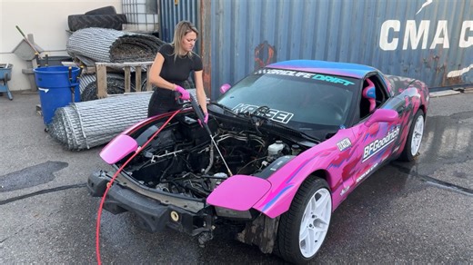 Cleaning an engine bay with pressure washing